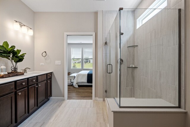 3214 Lincoln Prairie Blvd, Aurora, IL 60503 - ensuite bathroom featuring vanity, a shower stall, tile patterned flooring, and baseboards