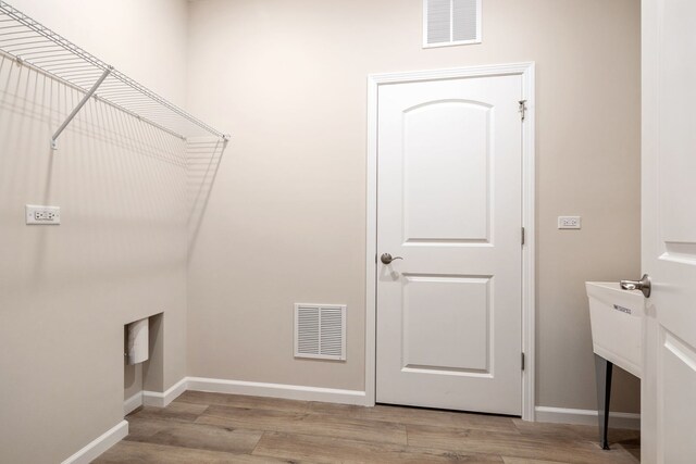 3214 Lincoln Prairie Blvd, Aurora, IL 60503 - washroom featuring light wood-type flooring and baseboards