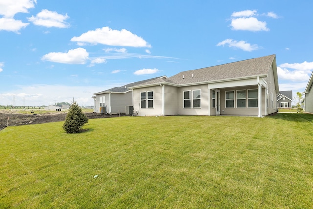 3214 Lincoln Prairie Blvd, Aurora, IL 60503 - back of property featuring a yard and central AC