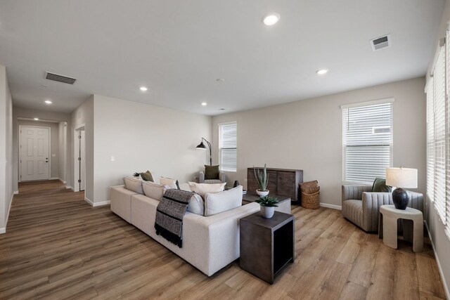 3214 Lincoln Prairie Blvd, Aurora, IL 60503 - living room with light wood-style floors, baseboards, and recessed lighting