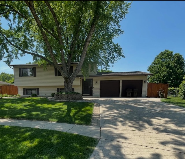 969 Camelot Pl, Crystal Lake, IL 60014 - split level home featuring a garage and concrete driveway
