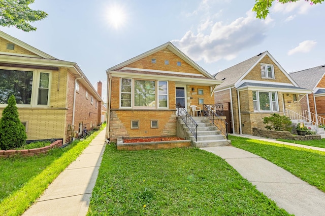 7222 S Christiana Ave, Chicago, IL 60629 - bungalow-style house with a front yard and brick siding