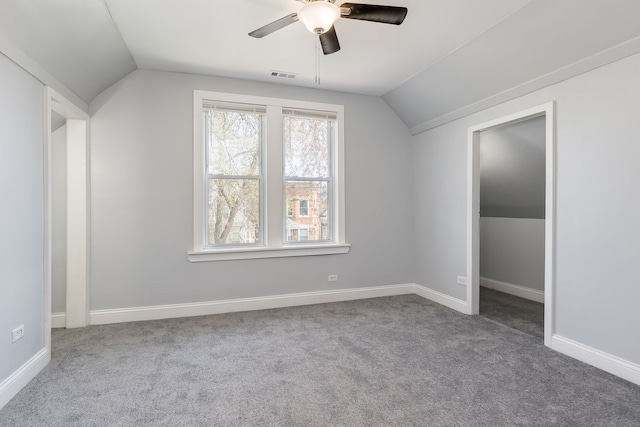 6132 S Justine St, Chicago, IL 60636 - additional living space featuring vaulted ceiling, carpet floors, ceiling fan, and baseboards