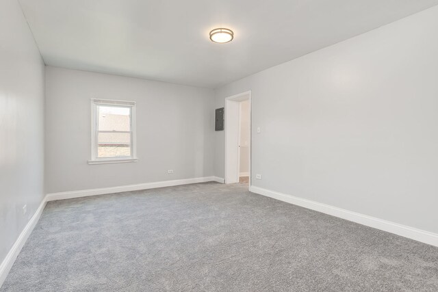 6132 S Justine St, Chicago, IL 60636 - spare room with carpet floors and baseboards