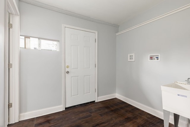 6132 S Justine St, Chicago, IL 60636 - washroom featuring washer hookup, dark wood-type flooring, baseboards, and crown molding