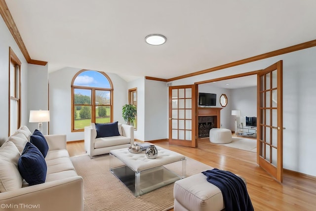 13714 S Janas Pkwy, Homer Glen, IL 60491 - living room featuring wood finished floors, ornamental molding, french doors, a fireplace, and baseboards