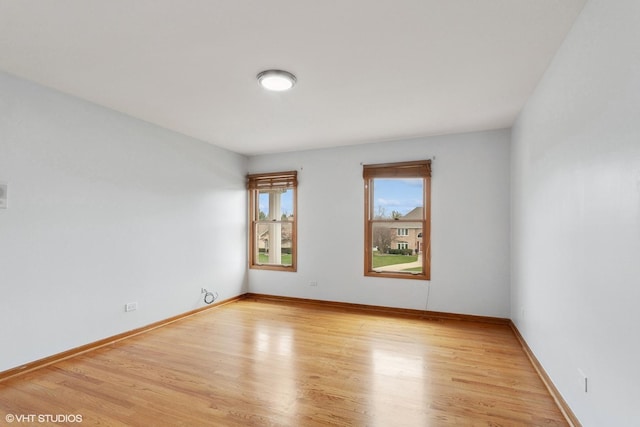 13714 S Janas Pkwy, Homer Glen, IL 60491 - spare room with light wood finished floors and baseboards