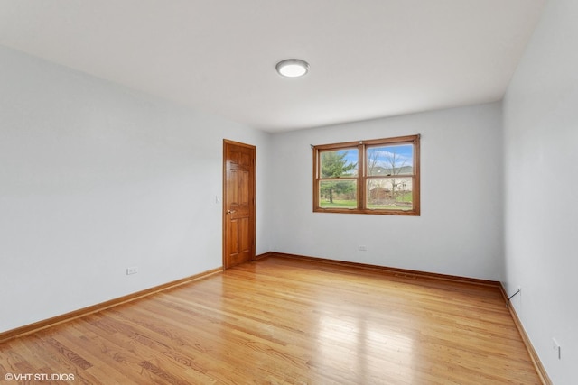 13714 S Janas Pkwy, Homer Glen, IL 60491 - spare room with light wood finished floors and baseboards
