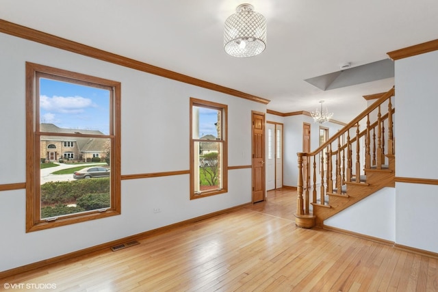 13714 S Janas Pkwy, Homer Glen, IL 60491 - foyer featuring a chandelier, stairs, hardwood / wood-style floors, baseboards, and crown molding
