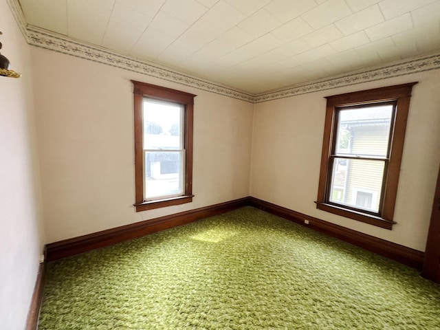 1306 E 4th St, Sterling, IL 61081 - unfurnished room with healthy amount of natural light and carpet