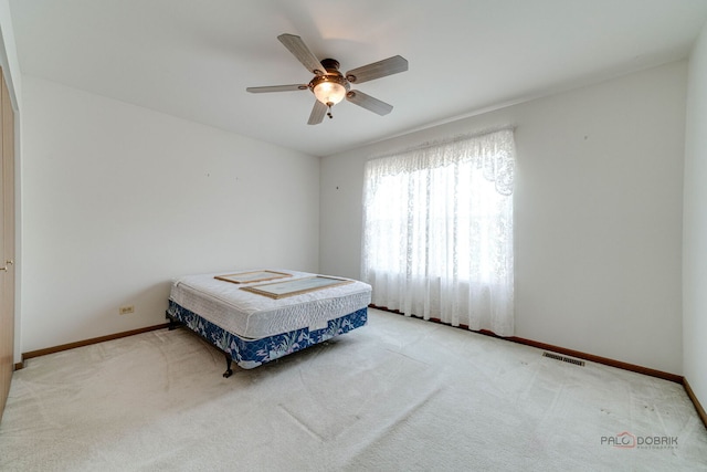 1927 Oaktree Trl, Lake Villa, IL 60046 - carpeted bedroom featuring baseboards and ceiling fan