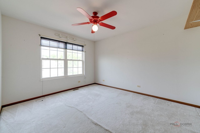 1927 Oaktree Trl, Lake Villa, IL 60046 - empty room with carpet flooring, baseboards, and ceiling fan