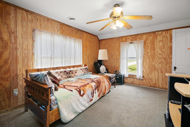 4391 N State Route 1-17, Momence, IL 60954 - bedroom with multiple windows, wooden walls, carpet floors, and ceiling fan