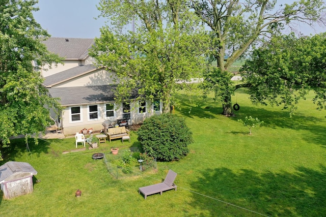 4391 N State Route 1-17, Momence, IL 60954 - view of green lawn featuring a fire pit and a deck