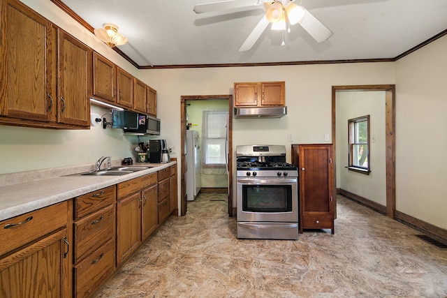 4391 N State Route 1-17, Momence, IL 60954 - kitchen with stainless steel range with gas stovetop, under cabinet range hood, black microwave, brown cabinets, and crown molding