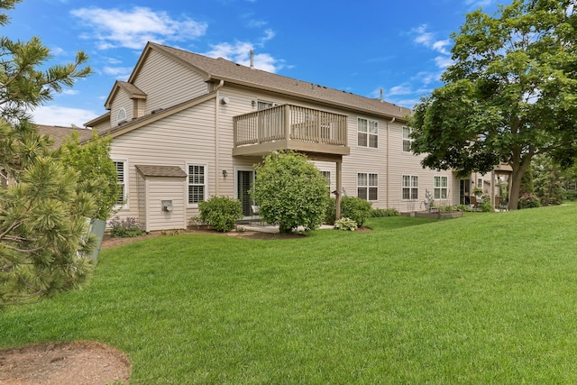 743 Sycamore Ct, Lindenhurst, IL 60046 - rear view of house with a balcony, a lawn, and a shingled roof