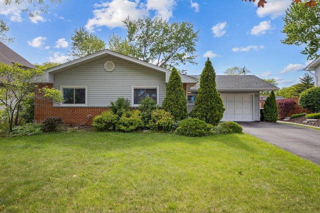 1850 Pierce Rd, Hoffman Estates, IL 60169 - view of front of property with driveway, a front yard, a garage, and brick siding