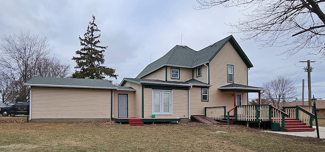 1 S Stanton St, Shannon, IL 61078 - rear view of property featuring a deck and a lawn