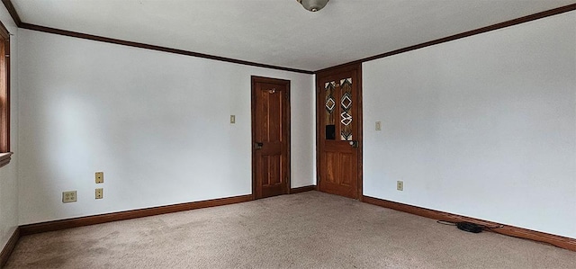 1 S Stanton St, Shannon, IL 61078 - spare room featuring ornamental molding, carpet floors, and baseboards