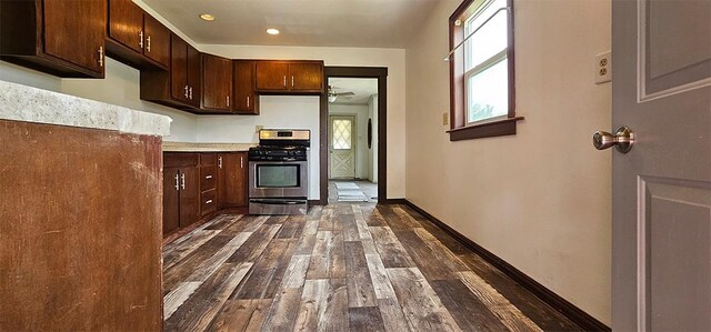 1 S Stanton St, Shannon, IL 61078 - kitchen featuring gas range, dark wood-style floors, plenty of natural light, dark brown cabinets, and recessed lighting