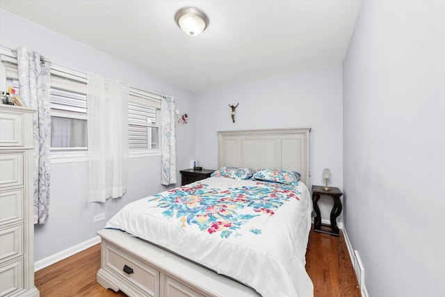 5642 W Dakin St, Chicago, IL 60634 - bedroom with light wood-type flooring and baseboards