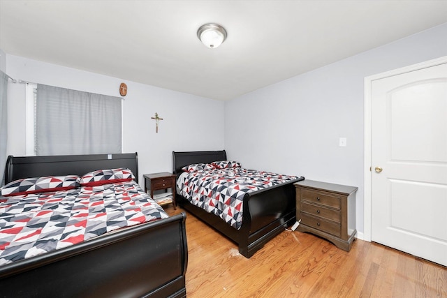 5642 W Dakin St, Chicago, IL 60634 - bedroom with light wood-style floors
