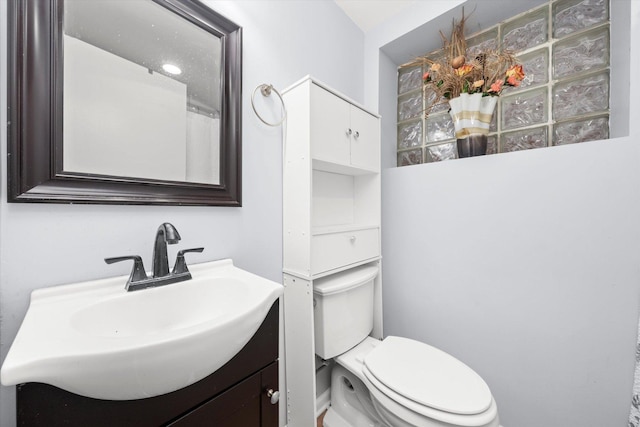 5642 W Dakin St, Chicago, IL 60634 - half bathroom with vanity and toilet