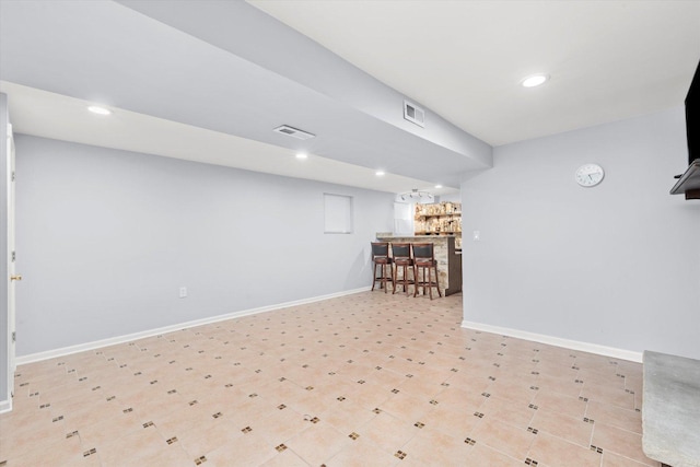 5642 W Dakin St, Chicago, IL 60634 - finished basement featuring bar area, recessed lighting, and baseboards