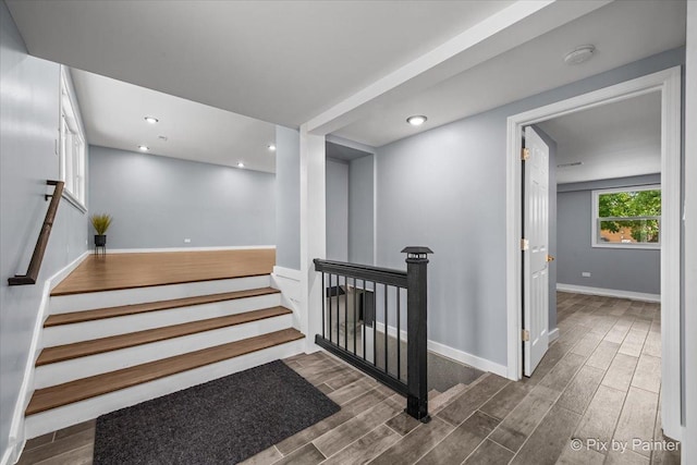 14028 S Wayman Ln, Robbins, IL 60472 - stairway with wood finished floors and recessed lighting
