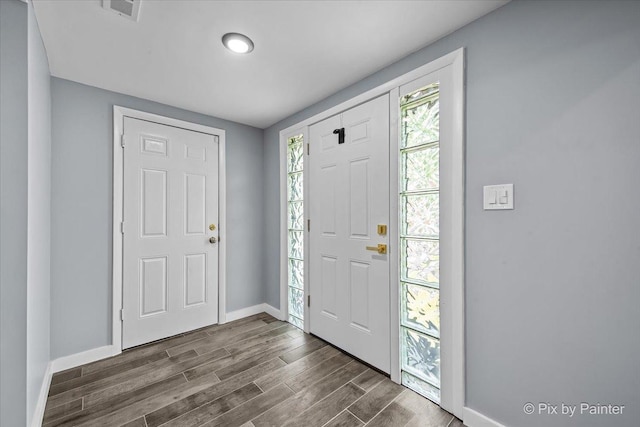 14028 S Wayman Ln, Robbins, IL 60472 - foyer entrance with baseboards and dark wood finished floors