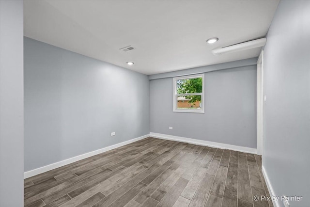14028 S Wayman Ln, Robbins, IL 60472 - unfurnished room with wood finished floors and recessed lighting