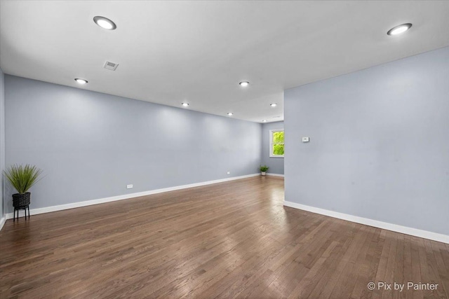 14028 S Wayman Ln, Robbins, IL 60472 - unfurnished room with wood finished floors and recessed lighting
