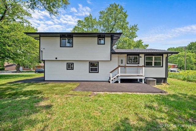 14028 S Wayman Ln, Robbins, IL 60472 - back of house featuring a yard and a patio