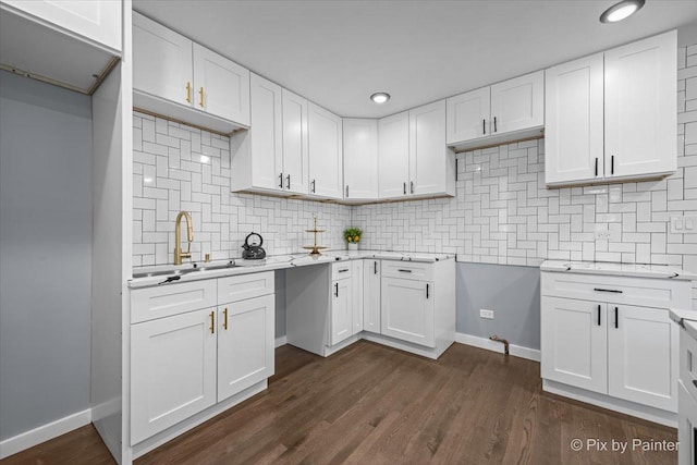 14028 S Wayman Ln, Robbins, IL 60472 - kitchen with tasteful backsplash, light countertops, white cabinets, dark wood-style flooring, and recessed lighting