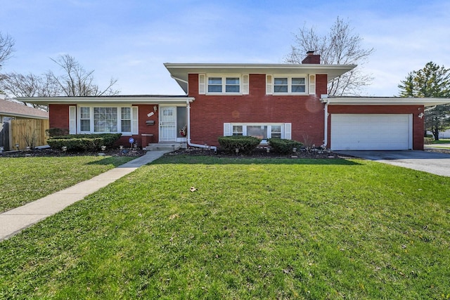 751 E 164th Pl, South Holland, IL 60473 - split level home with brick siding, driveway, a chimney, and an attached garage