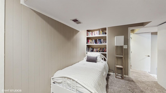 914 Ski Hill Rd, Fox River Grove, IL 60021 - bedroom featuring carpet floors and wood walls