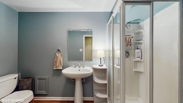 914 Ski Hill Rd, Fox River Grove, IL 60021 - bathroom featuring a shower stall and toilet