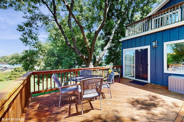 914 Ski Hill Rd, Fox River Grove, IL 60021 - wooden terrace featuring outdoor dining area