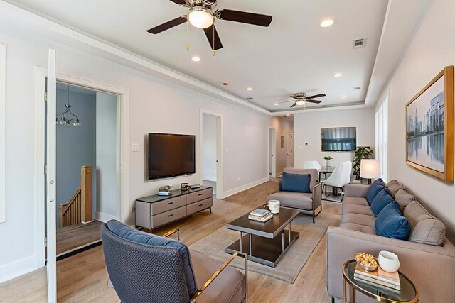 223 W 118th St, Chicago, IL 60628 - living area featuring a ceiling fan, light wood finished floors, recessed lighting, baseboards, and a raised ceiling