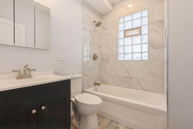 223 W 118th St, Chicago, IL 60628 - full bathroom with vanity, toilet, and shower / tub combination