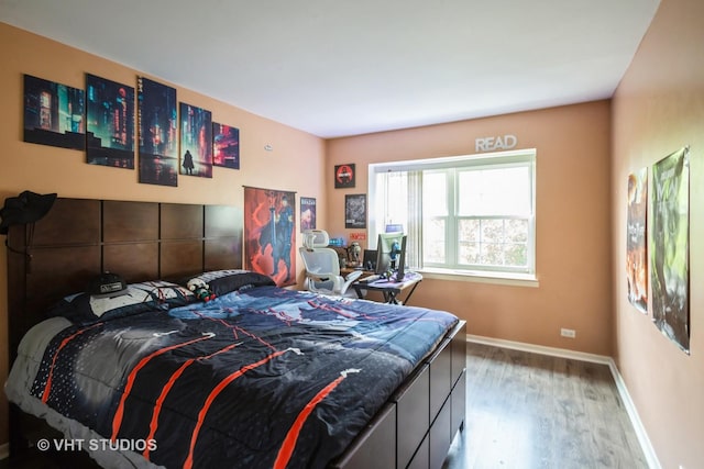 642 Burgundy Ct Unit A, Elk Grove Village, IL 60007 - bedroom with wood finished floors and baseboards