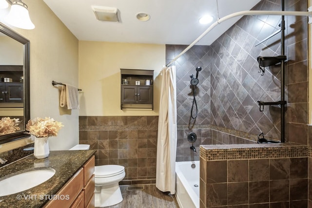 642 Burgundy Ct Unit A, Elk Grove Village, IL 60007 - full bathroom with tile walls, vanity, shower / bath combo, and recessed lighting