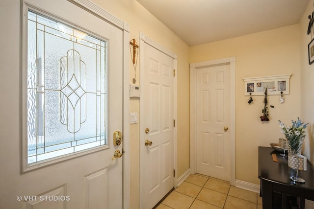 642 Burgundy Ct Unit A, Elk Grove Village, IL 60007 - entrance foyer featuring light tile patterned floors and baseboards