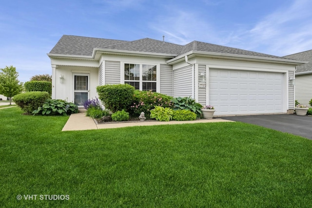 12140 Hideaway Dr, Huntley, IL 60142 - view of front facade with driveway, a front lawn, and a shingled roof
