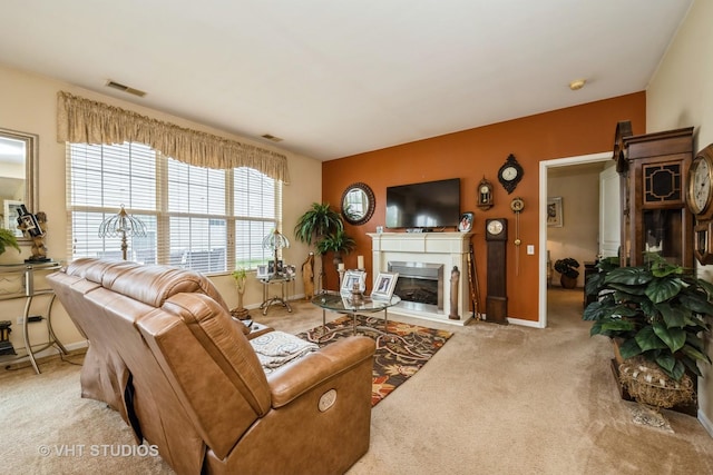 12140 Hideaway Dr, Huntley, IL 60142 - carpeted living area featuring a glass covered fireplace and baseboards