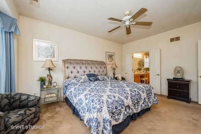12140 Hideaway Dr, Huntley, IL 60142 - carpeted bedroom with ensuite bathroom and ceiling fan