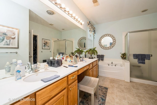12140 Hideaway Dr, Huntley, IL 60142 - full bath with a stall shower, double vanity, a bath, a spacious closet, and tile patterned flooring