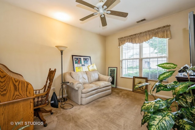 12140 Hideaway Dr, Huntley, IL 60142 - carpeted living room featuring a ceiling fan and baseboards
