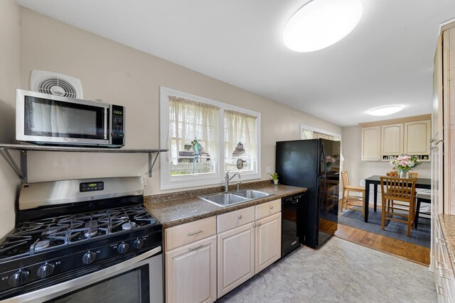 8819 Acorn Path, Wonder Lake, IL 60097 - kitchen with black appliances, a sink, and dark countertops