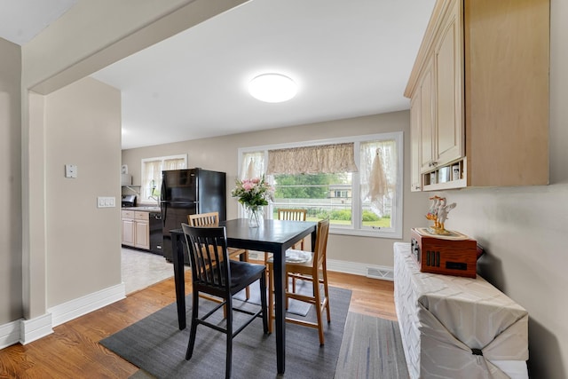 8819 Acorn Path, Wonder Lake, IL 60097 - dining room with wood finished floors and baseboards